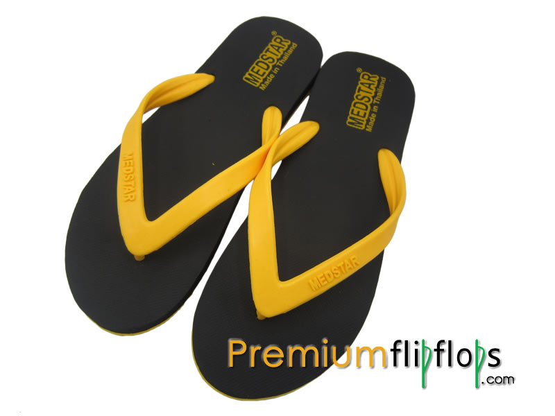 Black and yellow flip flops on sale